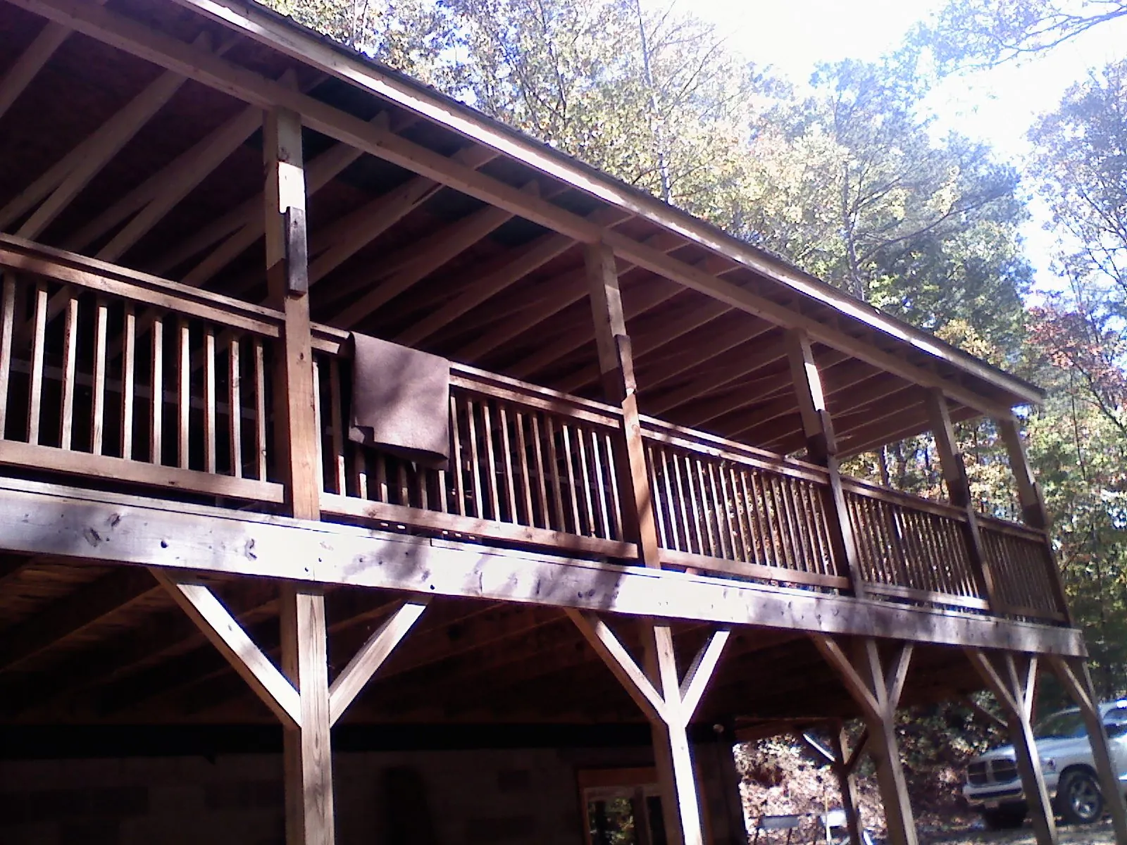 Timber framing under a new elevated porch and deck — Roof Leak Repair in Glyndon by Roofing Brothers
